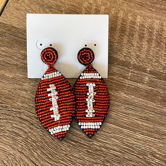 Jewelry - Beaded football earrings- new with tag!
